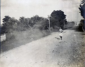Sam Mellor of the Mohawk Athletic Club Running Alone, Along the Dirt Road, in the Marathon Race at the 1904 Olympics by Jessie Tarbox Beals